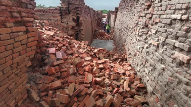 Several walls collapsed amid the flooding.