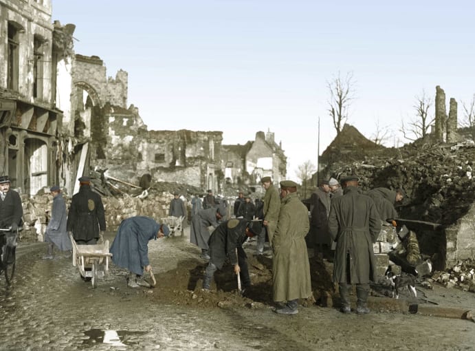 British soldiers guard German prisoners of war in France.