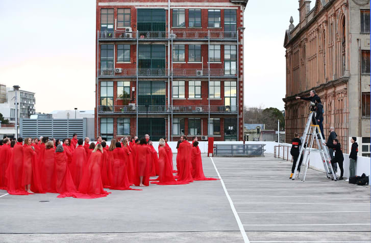 Spencer Tunick instructs participants to pose as part of his latest art installation "Return of the Nude," on July 9, 2018 in Melbourne, Australia. 