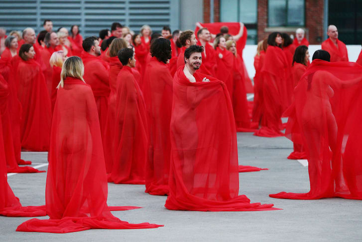 Participants pose as part of Spencer Tunick's nude art installation "Return of the Nude" on July 9, 2018 in Melbourne, Australia. 