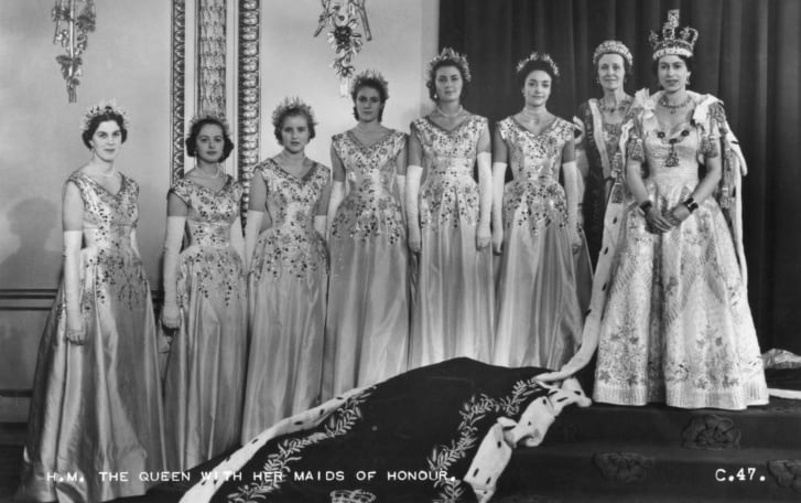 Society photographer Cecil Beaton, who took this photo of Queen Elizabeth with her maids of honor on her coronation day in 1953, captured many of the late monarch's most significant occasions. 