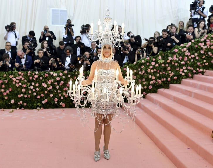 Katy Perry attends the Met Gala wearing Moschino.