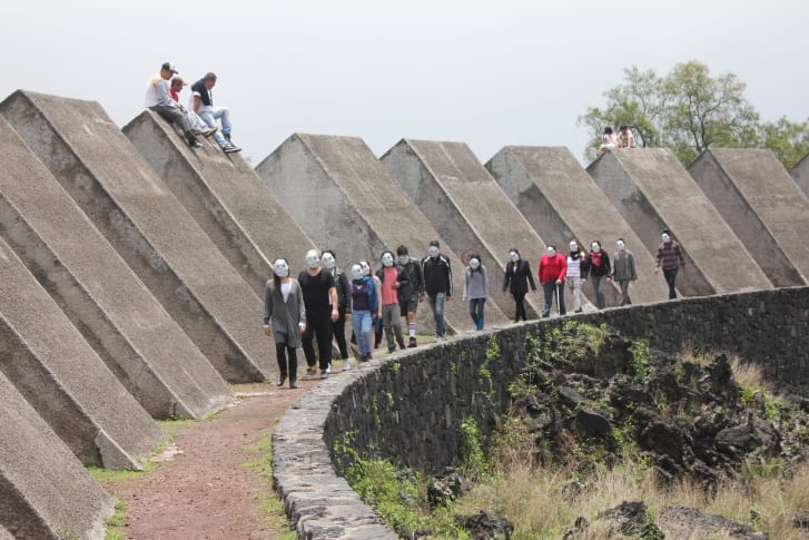 Participants in a public art performance by Zach Blas in Mexico City.