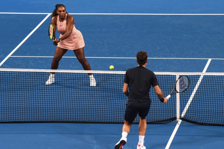 Serena Williams and Roger Federer during their mixed doubles match on day four of the Hopman Cup tennis tournament in Perth on January 1, 2019.