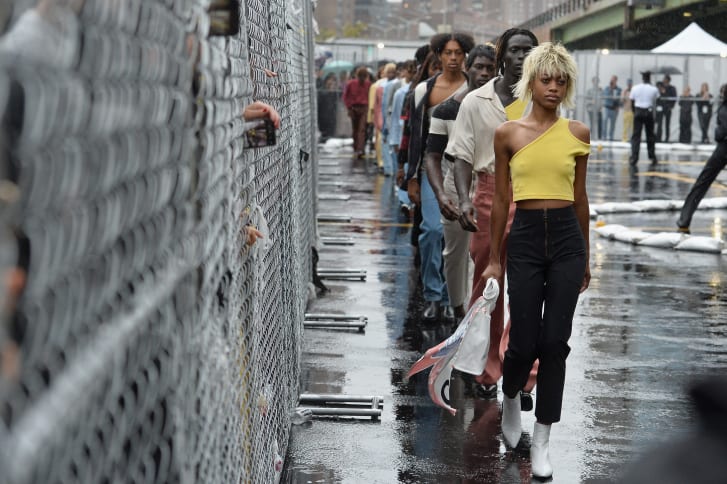 At the Spring-Summer 2019 edition of New York Fashion Week, Telfar held its show on a helipad near the East River, with audiences watching from behind a chain-link fence.