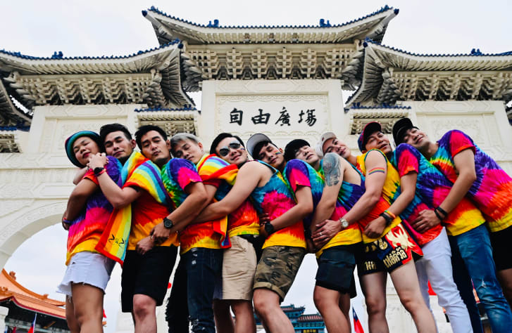 Participants at Taiwan's annual gay pride parade pictured outside the Chiang Kai-shek Memorial Hall in Taipei in October 2019.