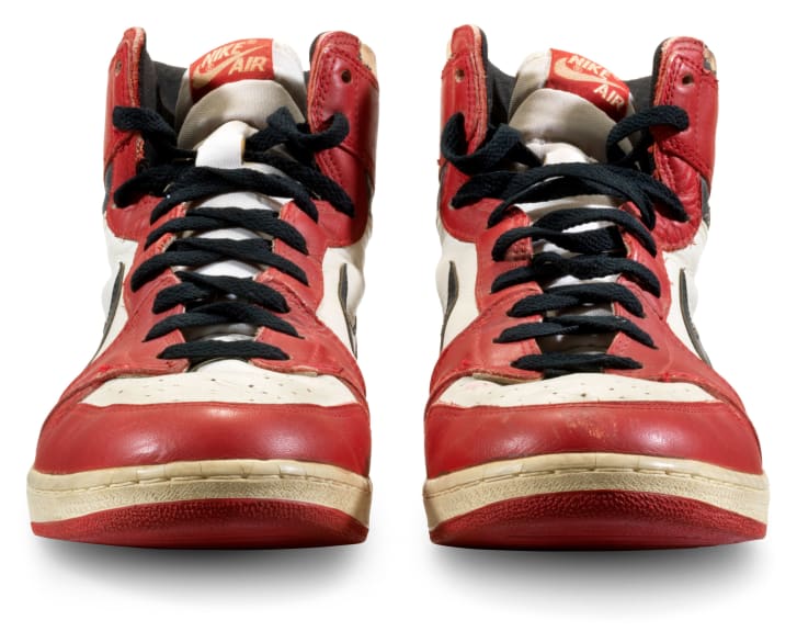 A pair of Michael Jordan's sneakers from 1985 have sold at auction for $615,000.