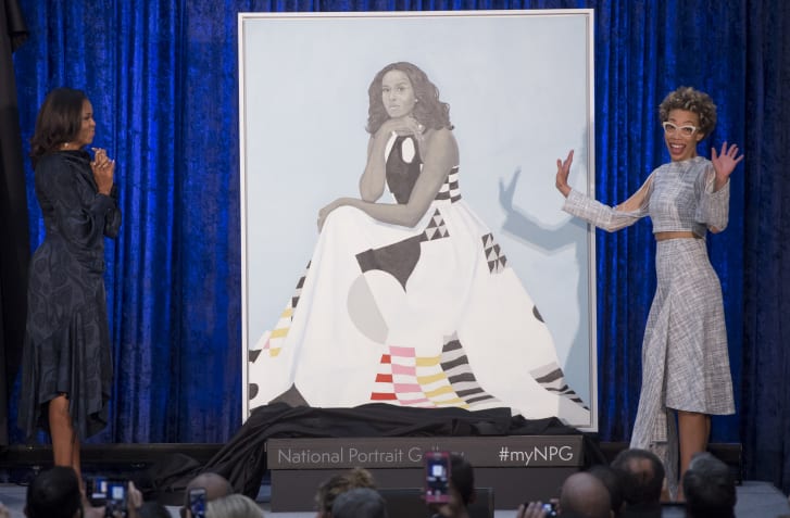 Former First Lady Michelle Obama and artist Amy Sherald at the Smithsonian's National Portrait Gallery in Washington, DC, in 2018. 