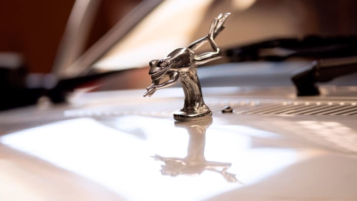 The vehicle comes with a silver frog mascot on the bonnet.