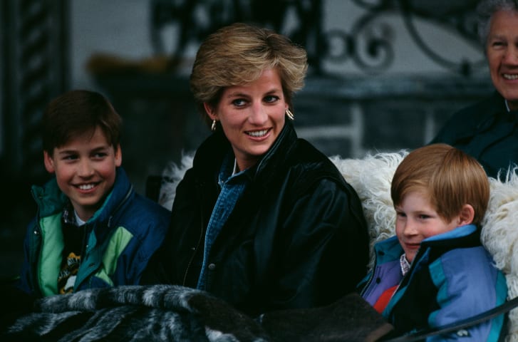 Diana on a ski vacation with her two sons, William (left) and Harry (right) in 1993. 