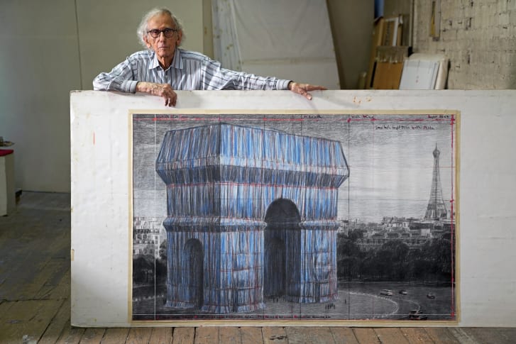 Christo in his studio in New York City with a preparatory drawing for "L'Arc de Triomphe, Wrapped" in 2019.