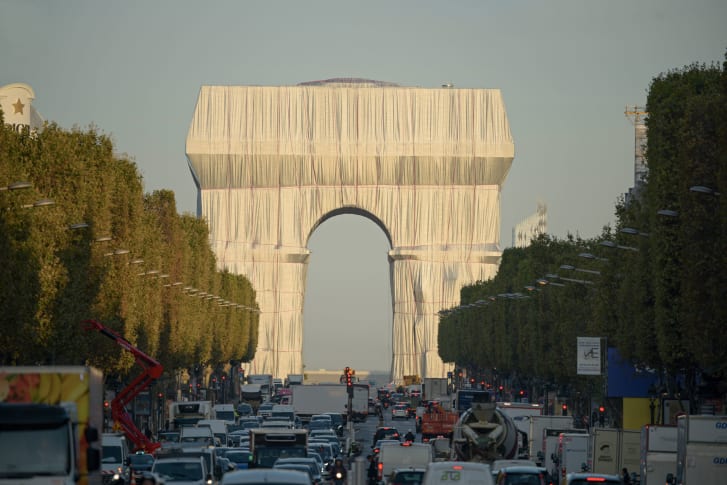 Sixty years after Christo and Jeanne-Claude first conceptualized the project, the Arc de Triomphe has been wrapped.