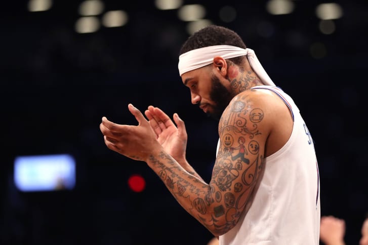 Mike Scott has a series of emoji tattoos on both arms, one of the more eclectic pieces in the league. 