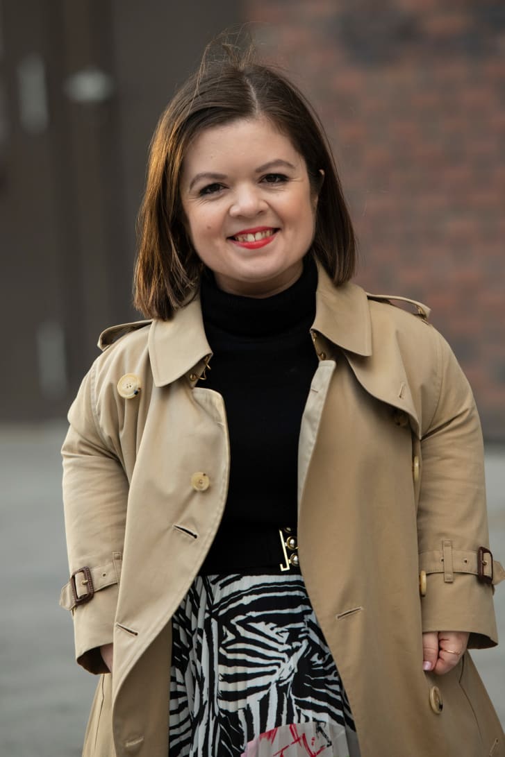 Writer, activist and broadcaster Sinéad Burke in a classic Burberry trench coat. 