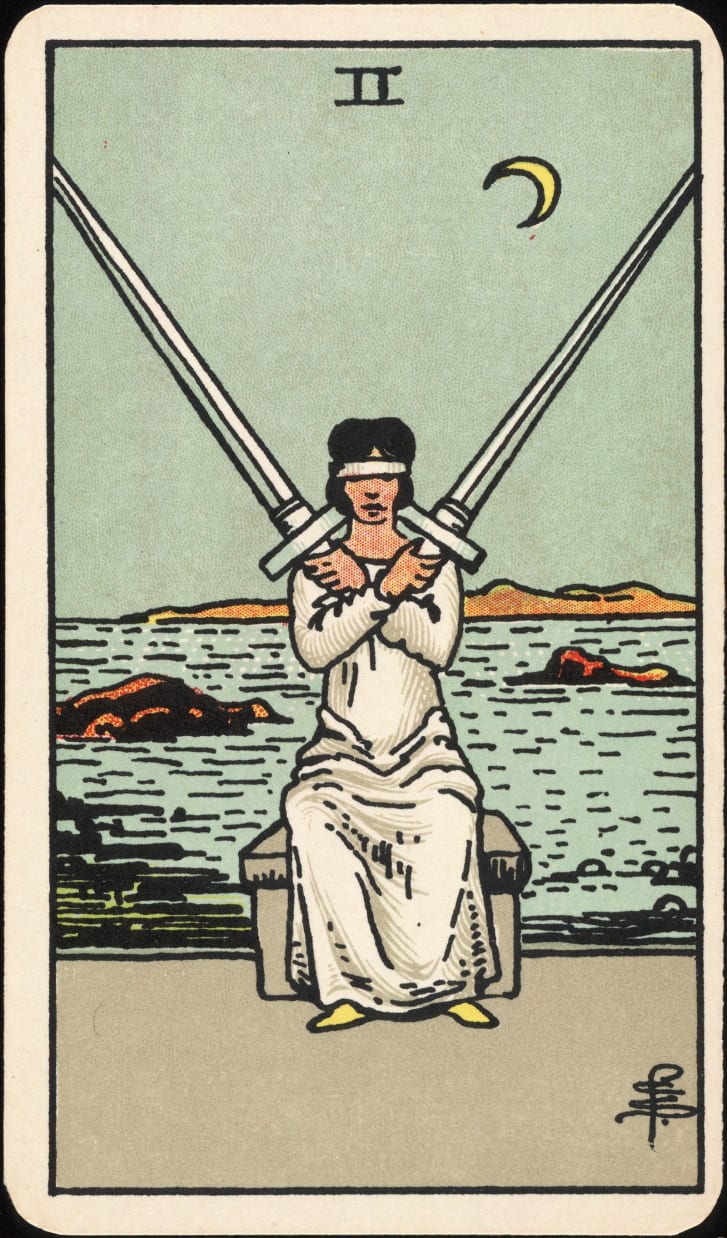 The Two of Swords. Smith conceptualized the 56 cards of the Minor Arcana entirely on her own.
