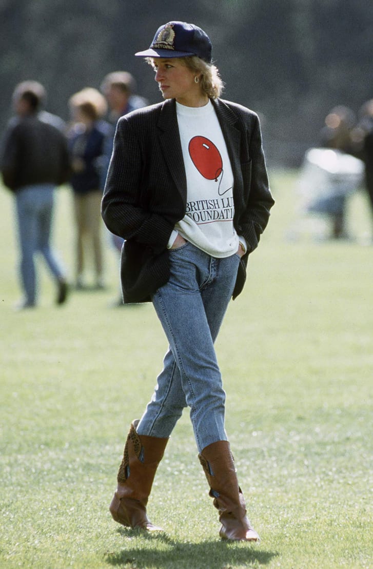 Another of Princess Diana's outfits frequently copied on social media is this one -- a sweatshirt from the British Lung Foundation (an organization for which Diana was a patron), oversized blazer, and baseball cap, which she wore to a polo match in 1988.
