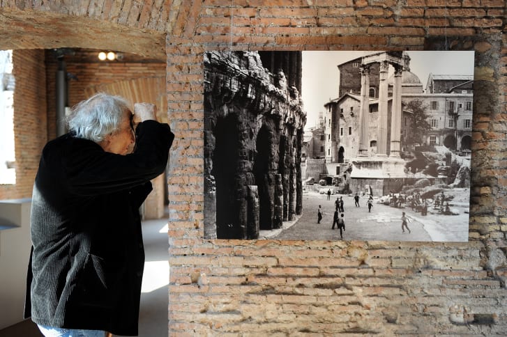 US photographer William Klein takes pictures during an exposition named "William Klein Rome photos - 1956/1960 ", in the Rome's Trajan Market on April 13, 2010.
