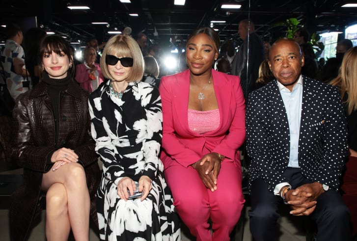 Anne Hathaway and Anna Wintour sit next to Serena Williams and Eric Adams at the Michael Kors Spring/Summer 2023 show in New York City.