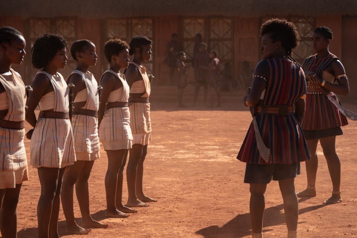 Viola Davis and Lashana Lynch with young recruits in "The Woman King."
