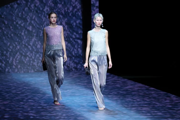 The Emporio Armani Spring-Summer 2023 show during Milan Fashion Week featured various reflective and iridescent fabrics.