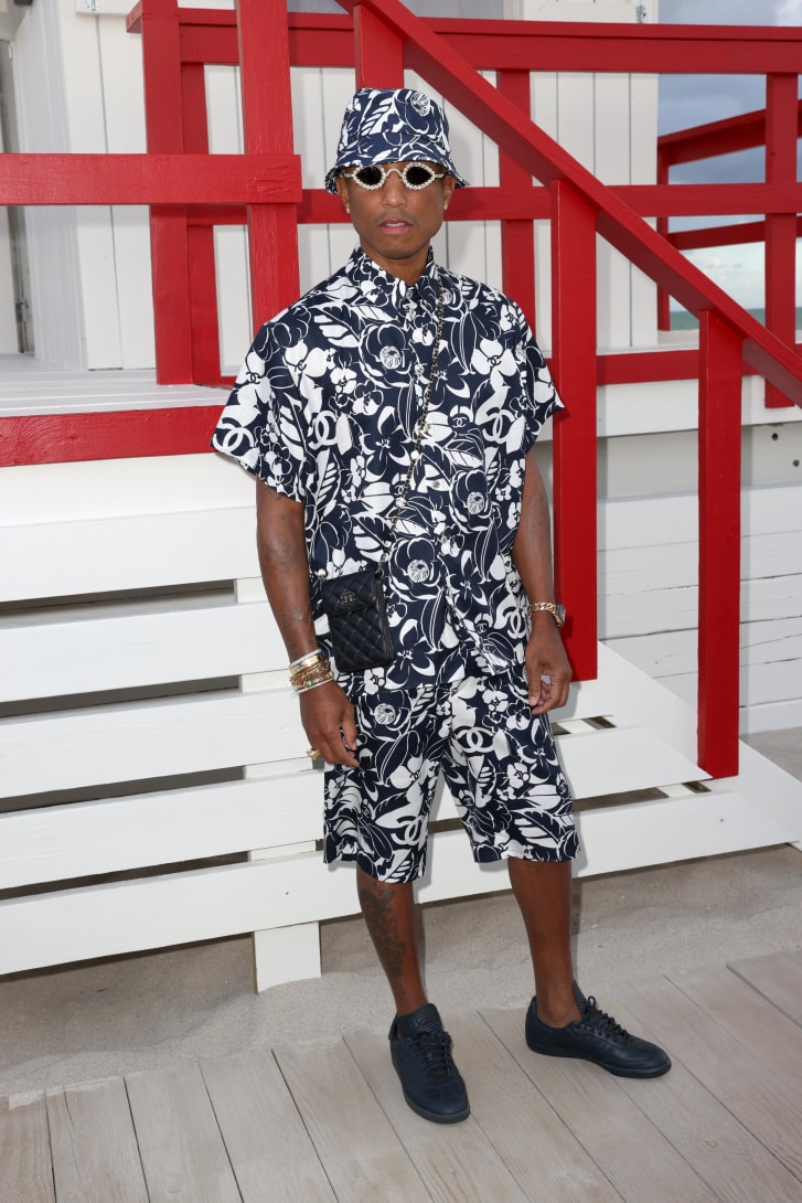Pharrell Williams attends the Chanel Cruise show. 