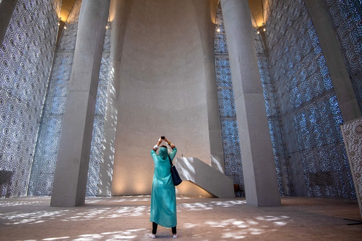 A member of the media visits the interior of the Imam al-Tayeb Mosque during a tour at the Abrahamic Family House in Abu Dhabi on February 21.