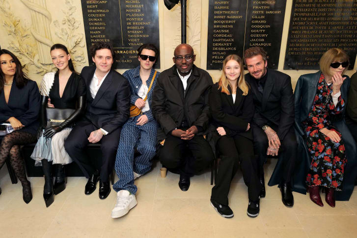 Eva Longoria, Nicola Peltz Beckham, Brooklyn Beckham, Cruz Beckham, Edward Enninful, Harper Beckham, David Beckham and Anna Wintour attend the Victoria Beckham FW23 show during Paris Fashion Week.