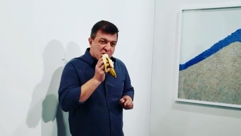 David Datuna, an installation and performance artist from Georgia, ate a banana that was duct-taped to a wall and priced at $120,000.