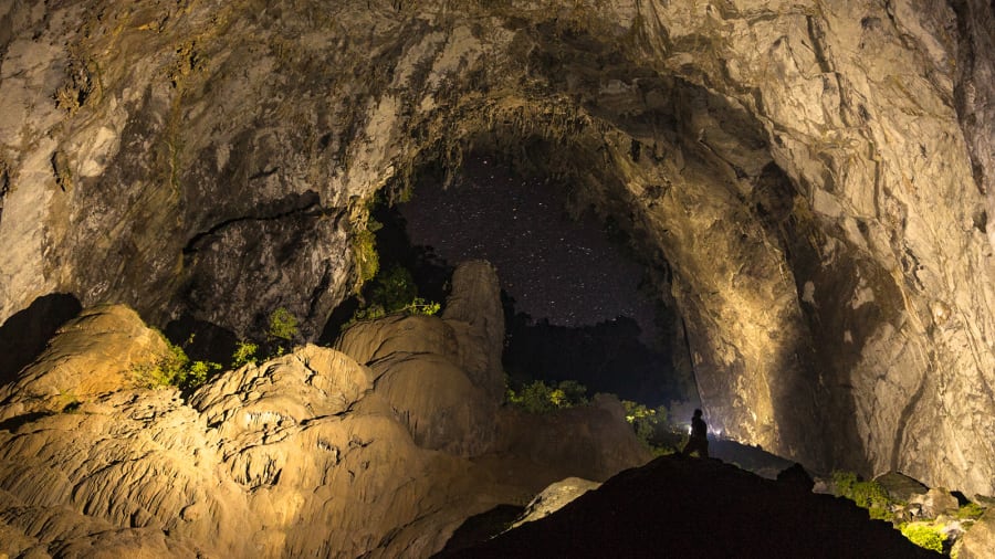 From the second campsite inside Hang Son Doong visitors can stare out of an erosion hole (these are known as "dolines") and catch stars glistening on a clear night | Jarryd Salem/CNN