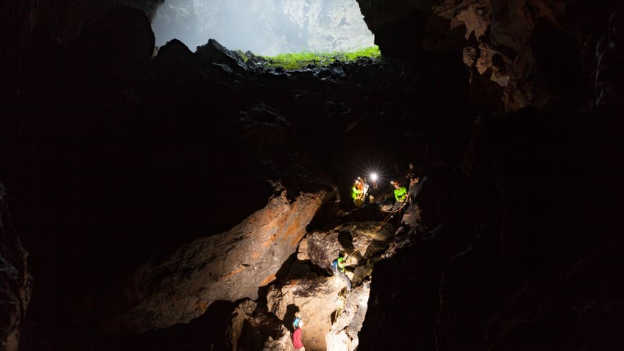 Sections of Hang Son Doong are so steep and perilous that ropes are required to help lower people safely through them | Jarryd Salem/CNN