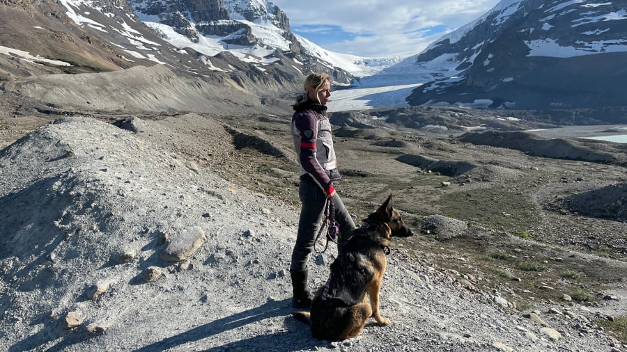 03 woman riding motorcycle around the world with dog Canada