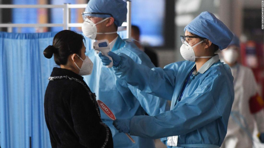 Beijing is enforcing a 14-day quarantine on international travelers, as coronavirus cases surge