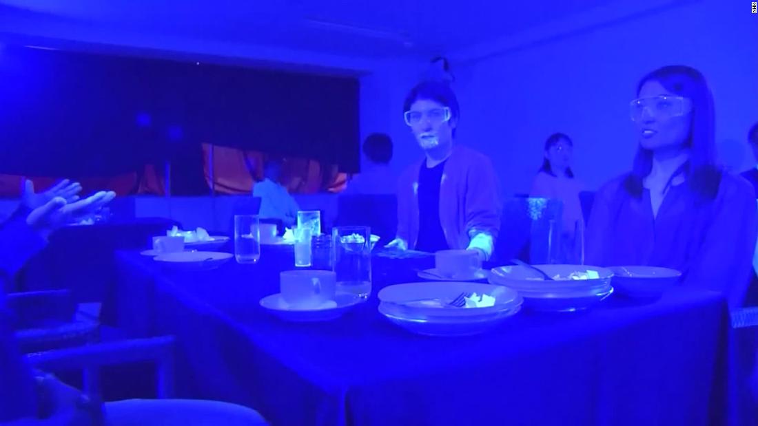Black light experiment shows how quickly a virus like Covid-19 can spread at a restaurant