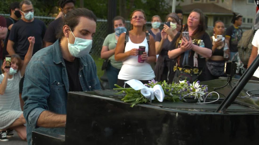 A traveling pianist played to protesters outside George Floyd's memorial to help Minneapolis heal