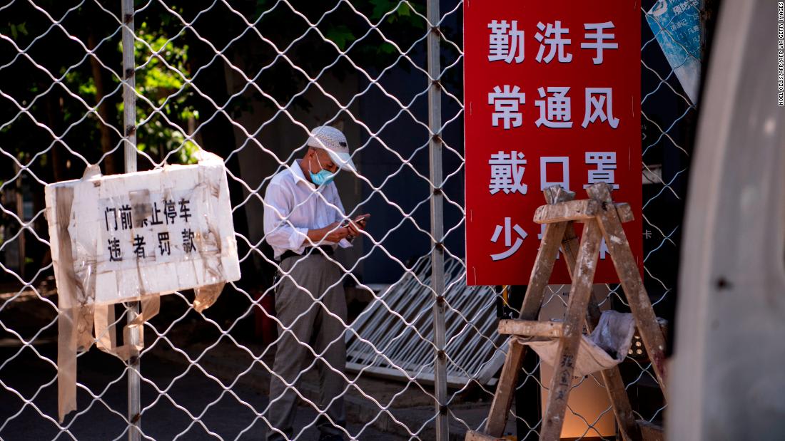 Beijing extends residential lockdowns as coronavirus infections spread