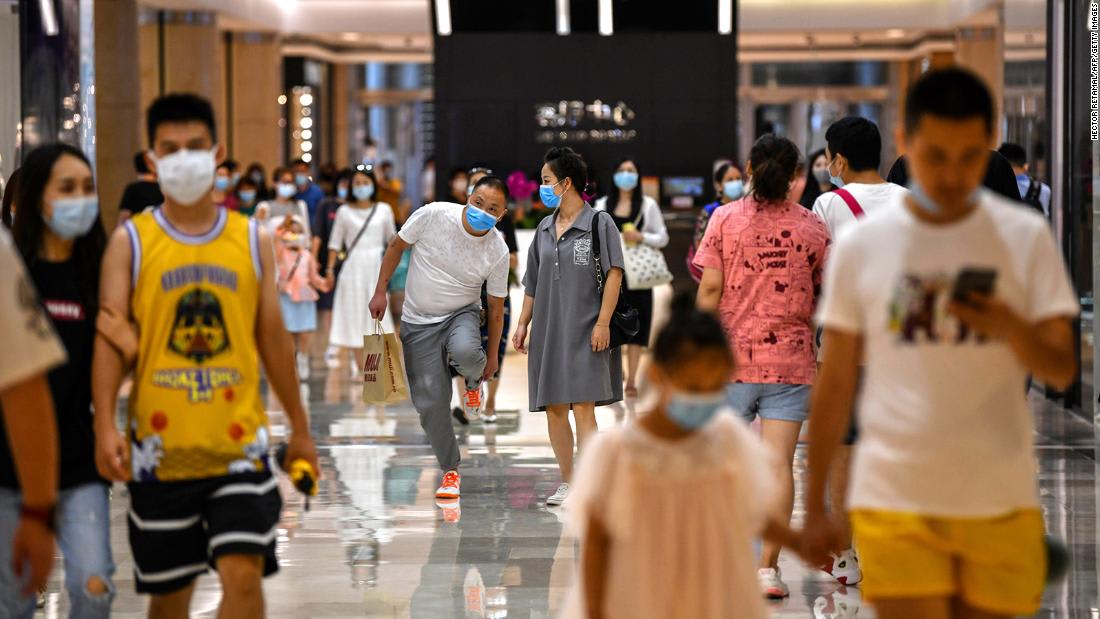 China's economy shrugs off global slump as shoppers join the recovery