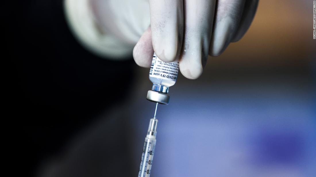 Here's why some people test positive after getting a Covid-19 vaccine