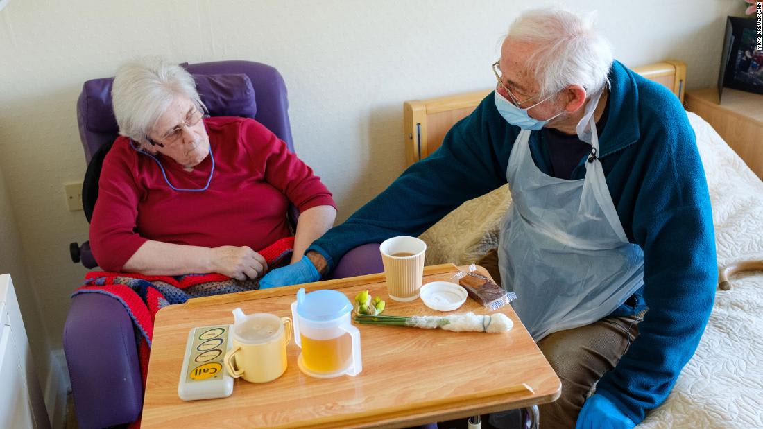 They can only hold hands, but for Britain's elderly, first touch with a relative 'means everything'