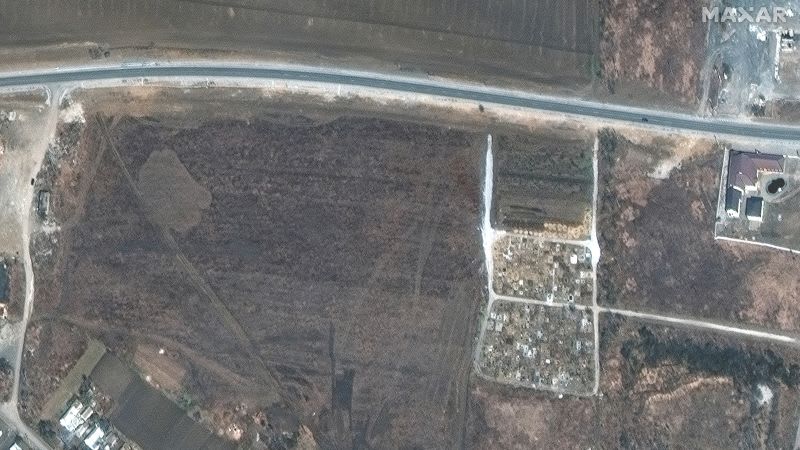 Mass graves near besieged Ukrainian city Mariupol are evidence of war crimes, say Ukrainian officials | CNN