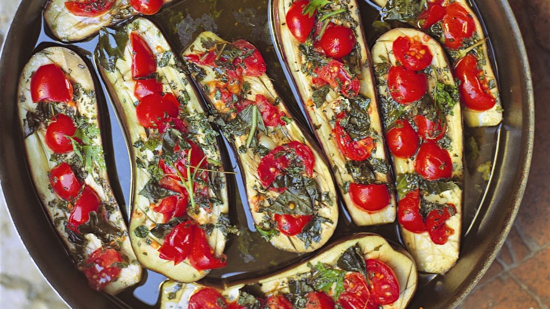 The name of this dish in Italian is "Melanzane ripiene al forno."