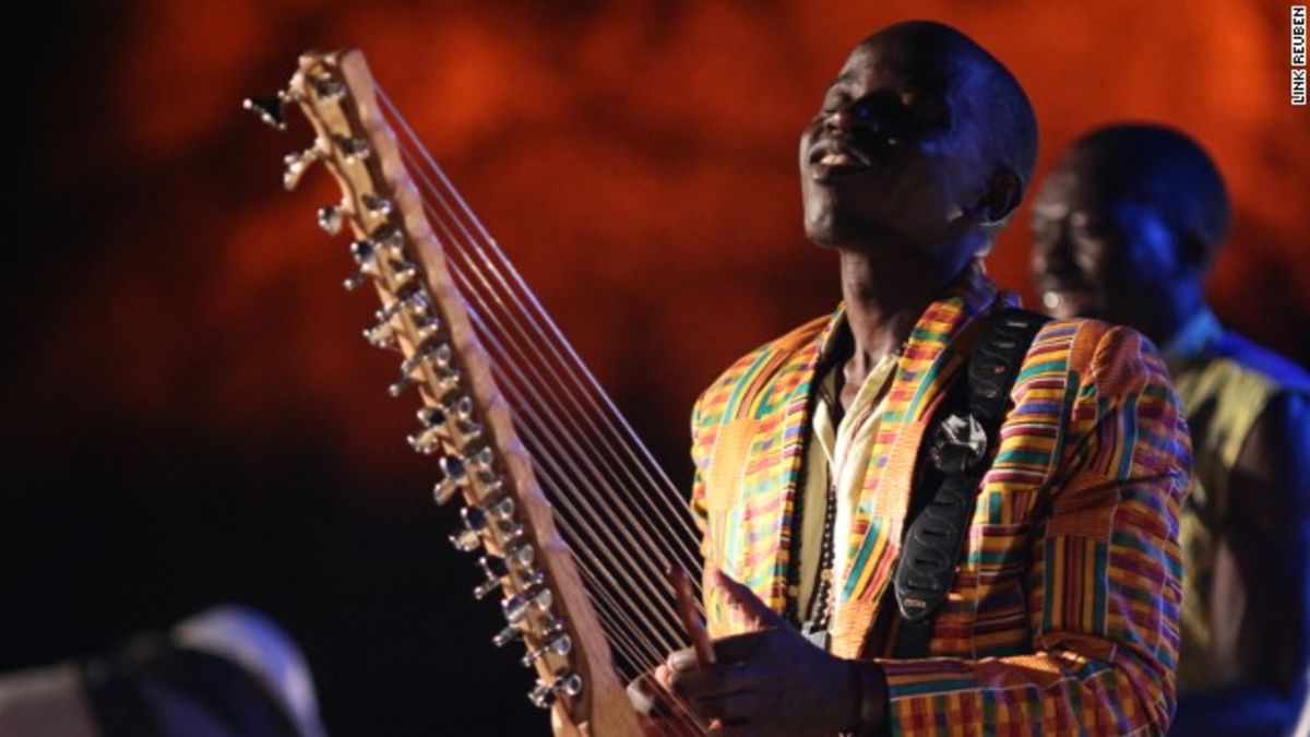 Современная африканская музыка. Африканские музыканты. Музыкальные инструменты Африки. Африканская мелодия. Певец из Занзибара.