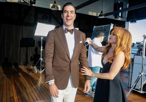 Actor Sacha Baron Cohen is cleaned up by his wife, Isla Fisher. They appeared on the show from Sydney. Rick Rycroft/Pool/Getty Images