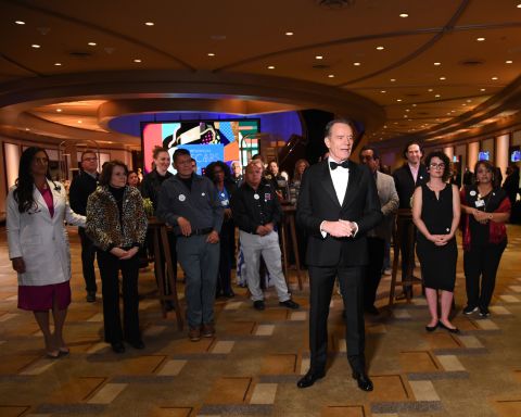 Actor Bryan Cranston recognizes some of the vaccinated front-line workers who were at the Dolby Theatre on Sunday night. Cranston was presenting the Jean Hersholt Humanitarian Award to the Motion Picture and Television Fund for the group's help and assistance to productions during the coronavirus pandemic. ABC/Getty Images