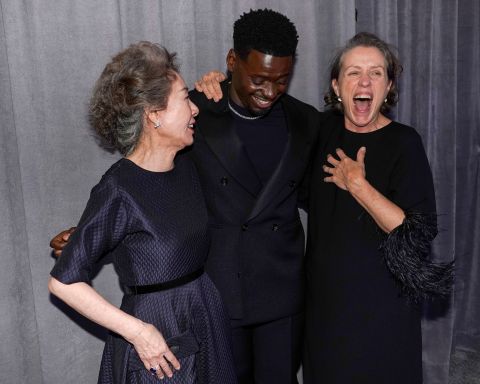 A trio of Oscar winners -- from left, Yuh-jung Youn, Daniel Kaluuya and Frances McDormand -- pose together in the press room. Youn won best supporting actress for her role in 'Minari.' Kaluuya won best supporting actor for his role in 'Judas and the Black Messiah.' And McDormand won best actress for 'Nomadland.' Chris Pizzello/Pool/Getty Images